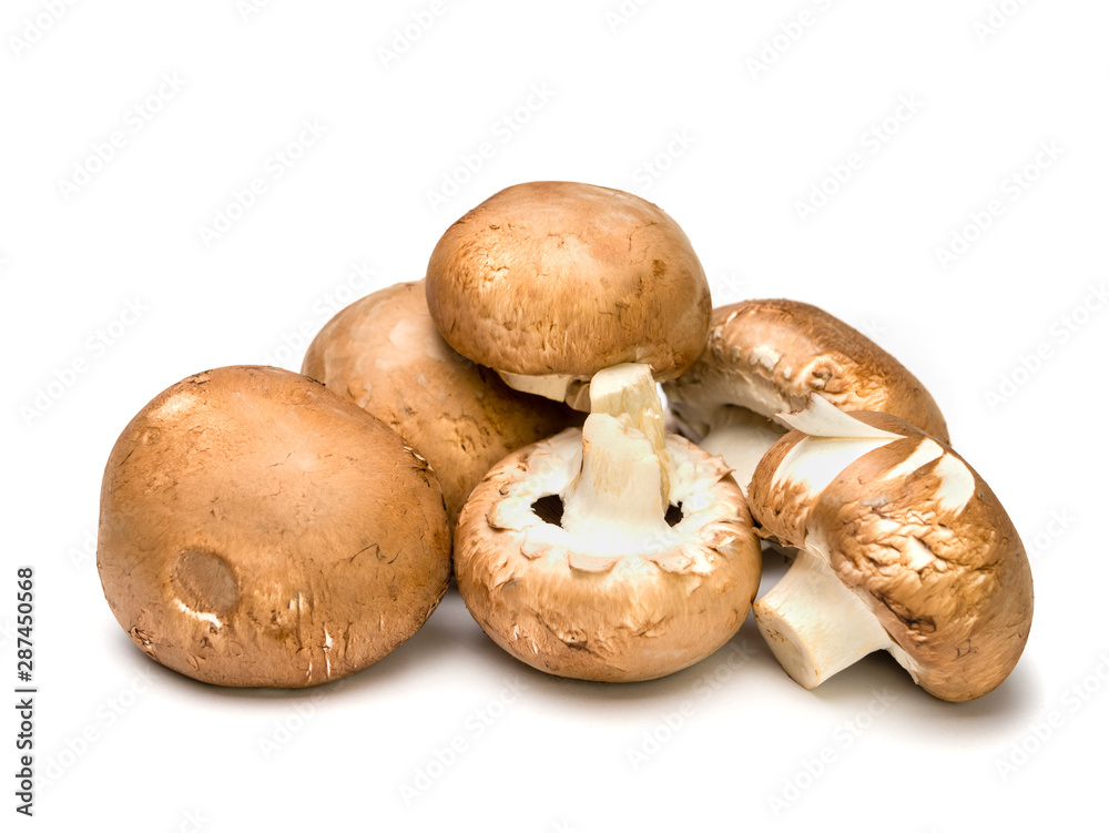 Close-up of raw and untreated champignons issolated on white Close-up of raw and untreated champignons issolated on white