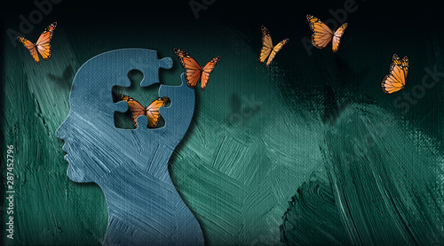 Graphic abstract of dreamlike butterflies flowing from iconic puzzle opening in mind photo