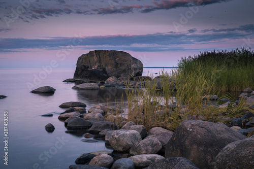 The Gulf of Finland, Estonia.Wild rocky coastline of the Baltic sea photo