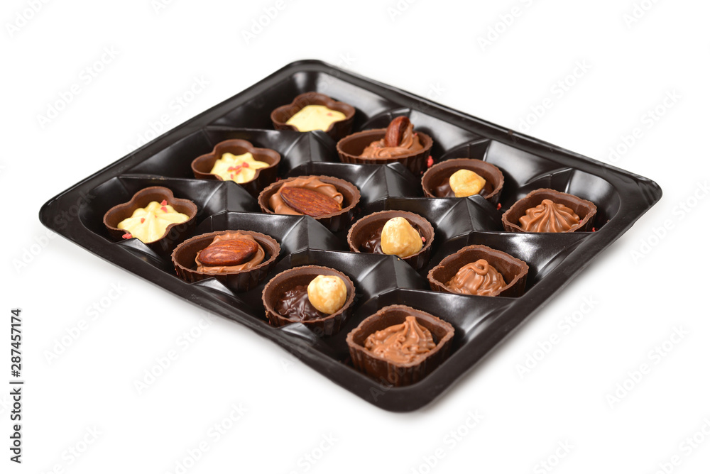 Chocolate candy collection in plastic box. Chocolate candy collection in plastic box.