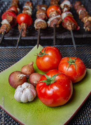 Arabic Barbecue food with fresh tomato sauce and garlic 