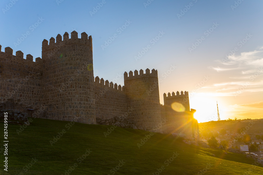 Last moments of sun on the walls of Avila with the clear sky