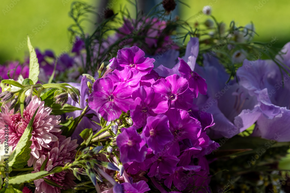Floristic bouquet of flowers, herbs and fruits that are the symbol of summer