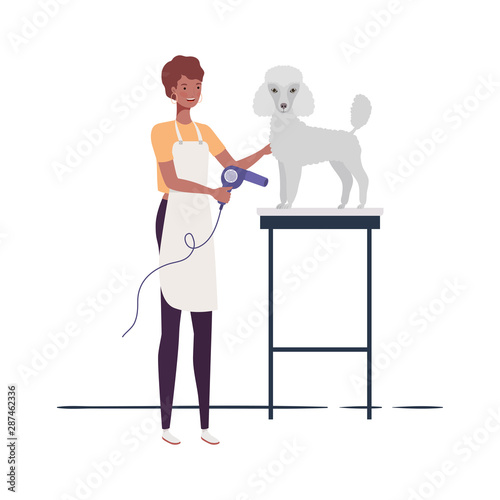 young woman with dog in pet groomer