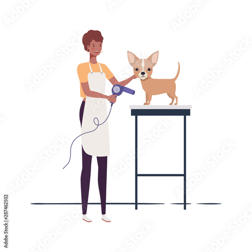 young woman with dog in pet groomer