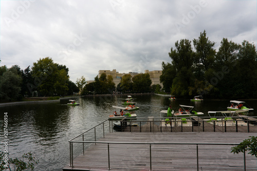 paddleboats on a lake in the gorky park in moscow photo