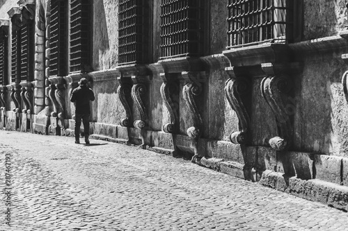 man walking in the street i...
