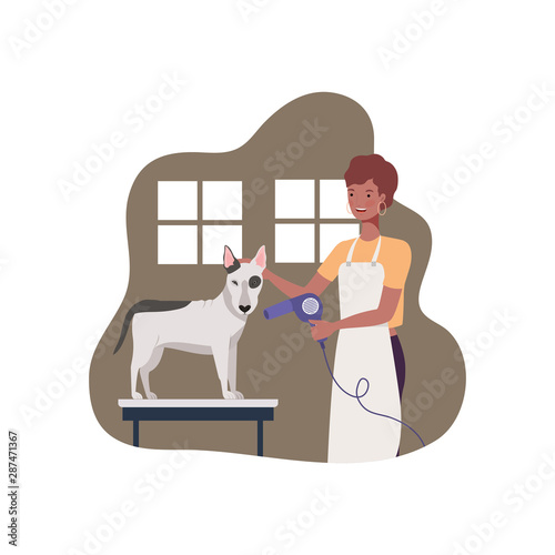 young woman with dog in pet groomer