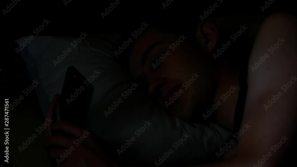 insomnia. guy watching a movie insomnia. guy watching a movie