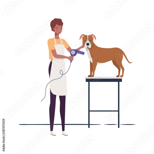 young woman with dog in pet groomer