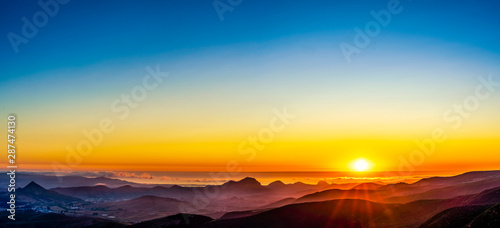 Panoramic Sunset over Ocean, Mountains, Valley