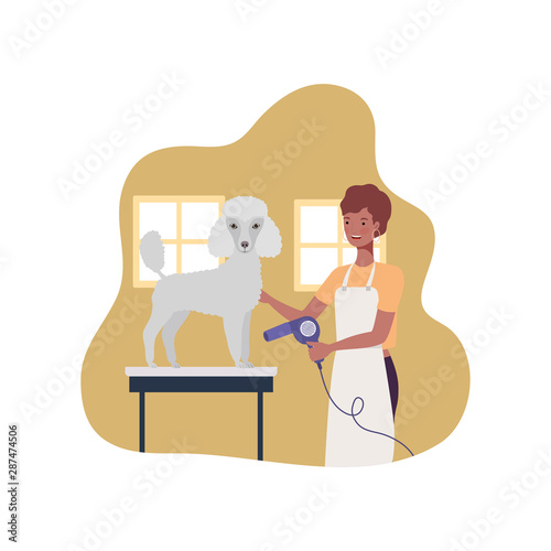 young woman with dog in pet groomer