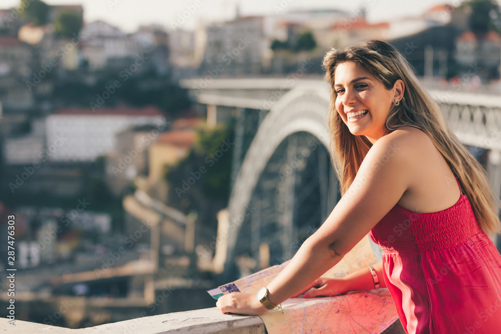 Woman enjoying sunset at Porto - Portugal