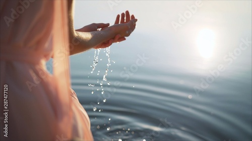 Fotografie, Obraz Feminine hands with spring water