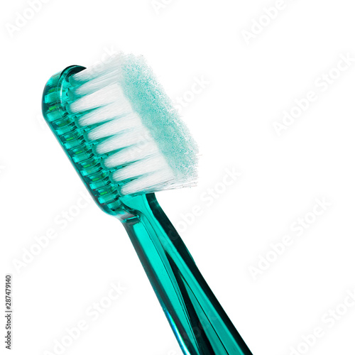 Ultra soft blue toothbrush super closeup macro showing each bristle isolated on white background