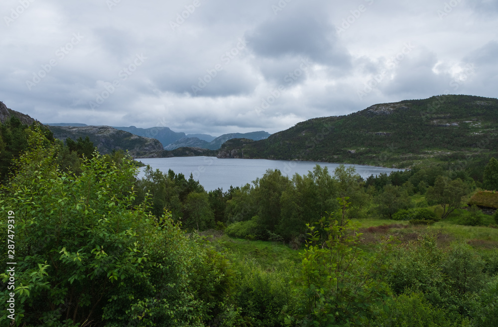 Lake Revsvatnet in the morning (Preikestolen trail, Norway). July 2019
