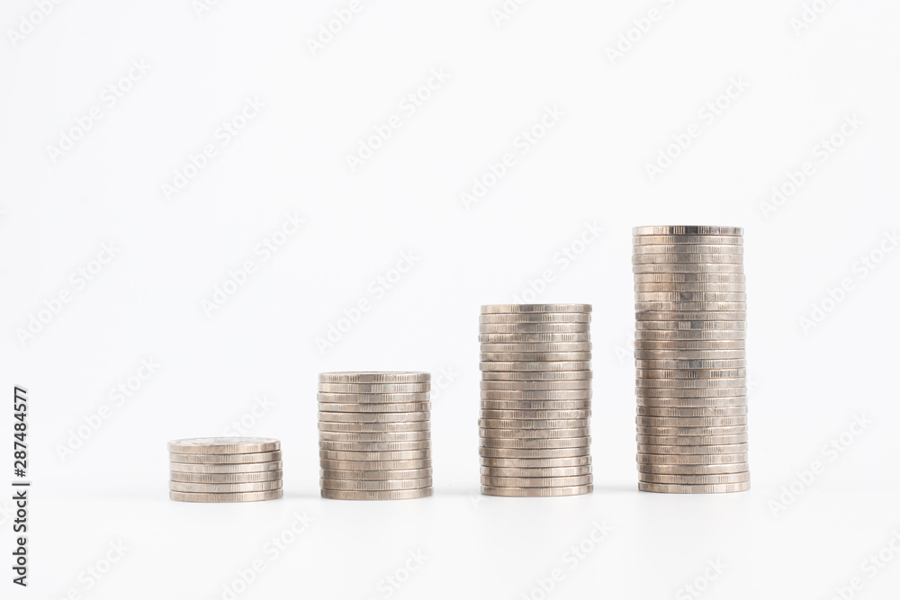 Growth pile of money coins isolated on white background with clipping path Growth pile of money coins isolated on white background with clipping path