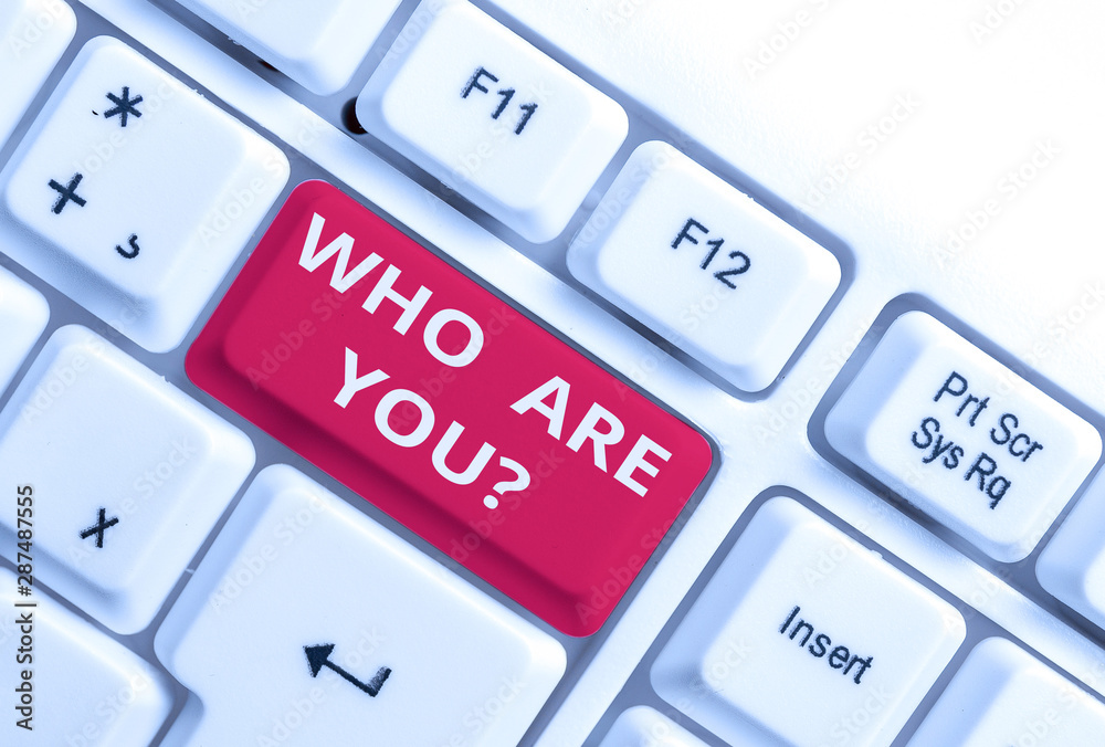 Word writing text Who Are You question. Business photo showcasing asking about demonstrating identity or demonstratingal information White pc keyboard with empty note paper above white background key Word writing text Who Are You question. Business photo showcasing asking about demonstrating identity or demonstratingal information White pc keyboard with empty note paper above white background key
