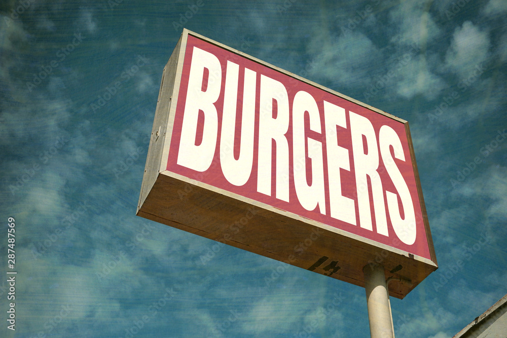 aged and worn burgers sign