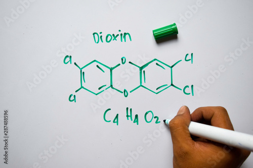 Dioxin (C4,H4,O2) molecule written on the white board. Structural chemical formula. Education concept photo