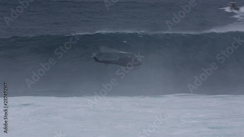 Helicopters Fly By HUGE WAVE in Hawaii photo
