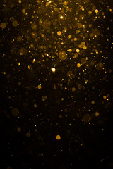 Abstract gold bokeh with black