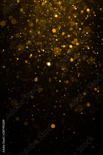Abstract gold bokeh with black