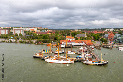 Gothenburg a beautiful city in Sweden, a view from the river Gota Alv on the shore line with boats and nice buildings