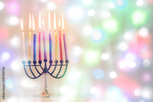 Hanukkah: Holiday Menorah With Variety Of Colorful Lit Candles.