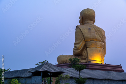 sunrise at the big Buddhist Monks Luang Phor Tuad Statue At Buddha Uttayarn Maharach Project Ayutthaya  Thailand .