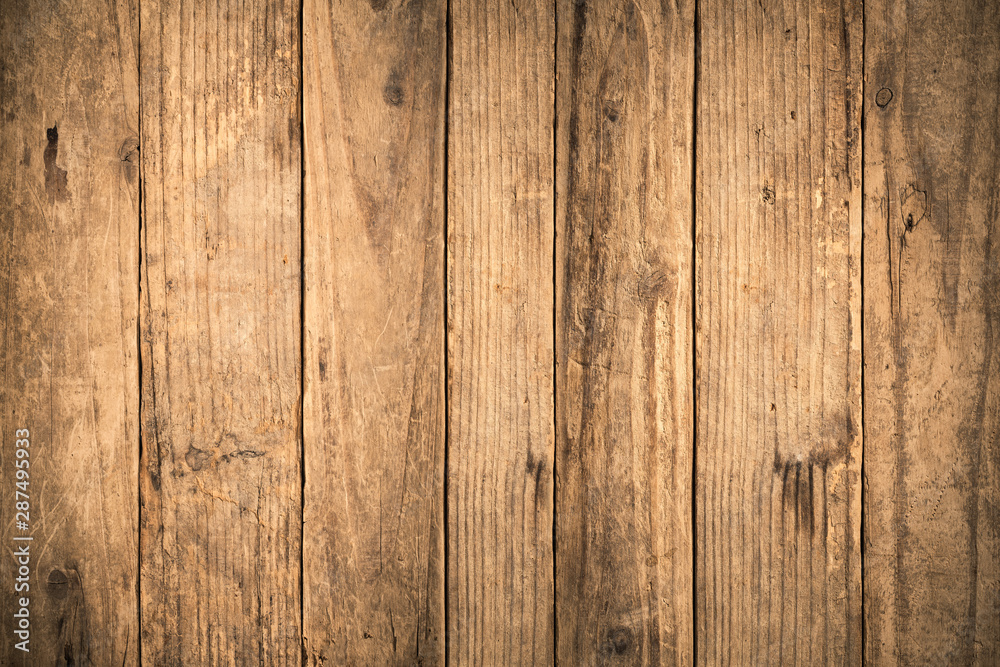 Old grunge dark textured wooden background,The surface of the old brown wood texture,top view brown teak wood paneling Old grunge dark textured wooden background,The surface of the old brown wood texture,top view brown teak wood paneling
