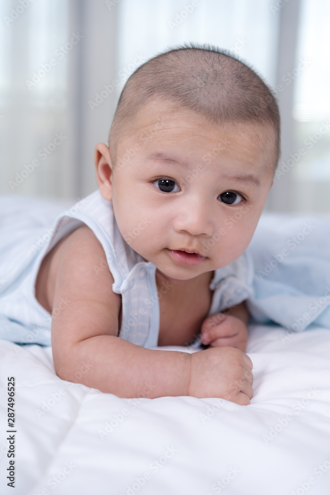 happy baby on a bed happy baby on a bed
