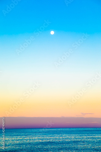Full Moon Setting at Sunrise in Hawaii
