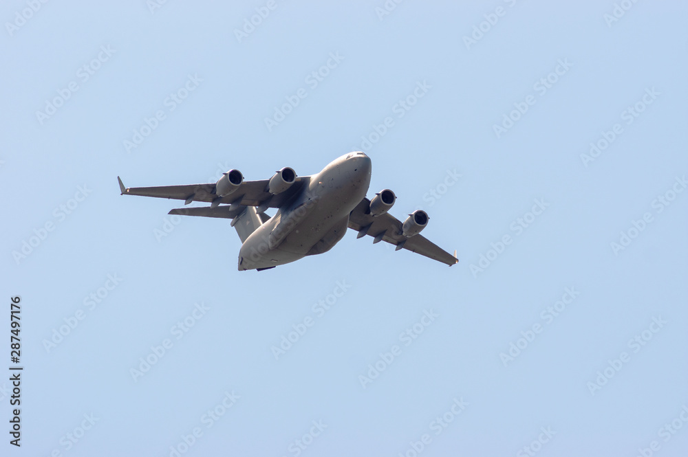 Military transport plane viewed from the front at an airshow Military transport plane viewed from the front at an airshow
