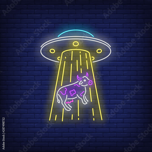 UFO abducting cow neon sign