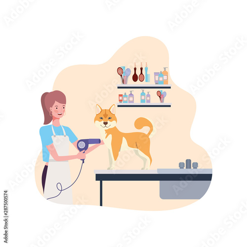 young woman with dog in pet groomer