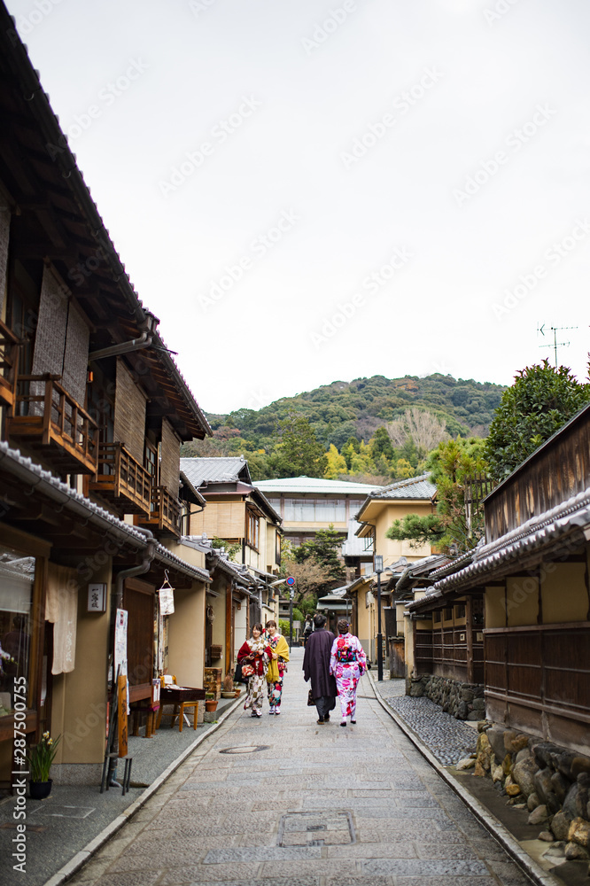 Some people dressed in the traditional Kimono are walking through the streets of Kyoto. Kyoto is the capital city of Kyoto Prefecture located in the Kansai region. Some people dressed in the traditional Kimono are walking through the streets of Kyoto. Kyoto is the capital city of Kyoto Prefecture located in the Kansai region.