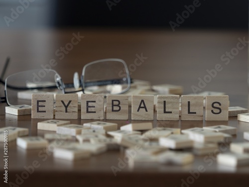 The concept of Eyeballs represented by wooden letter tiles photo