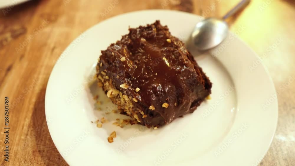 Delicious chocolate and peanut cake after dinner Delicious chocolate and peanut cake after dinner