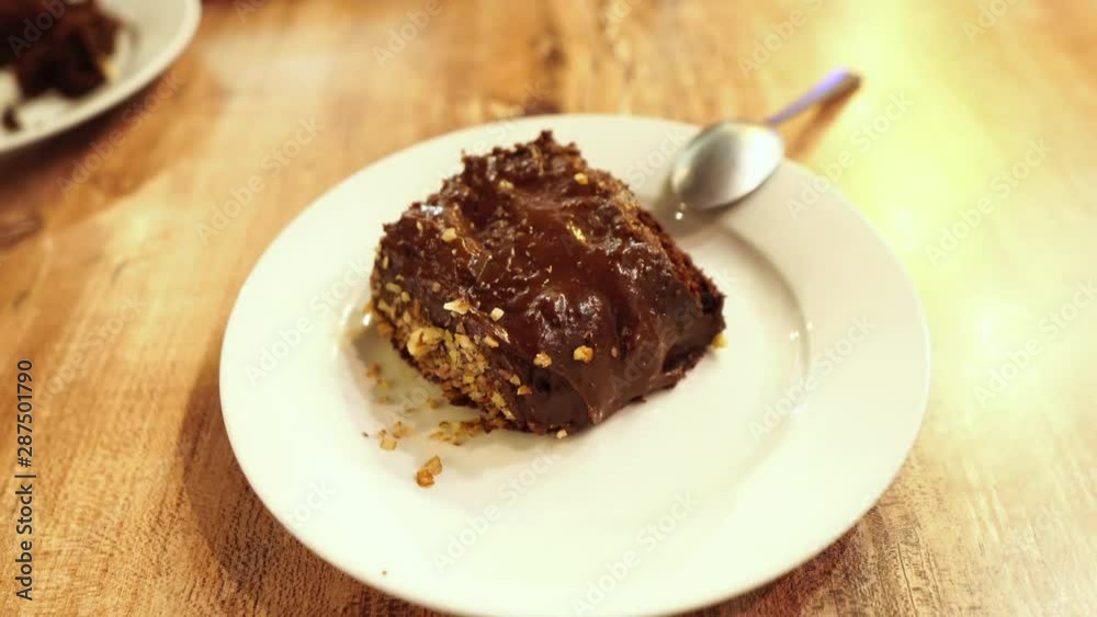 Delicious chocolate and peanut cake after dinner Delicious chocolate and peanut cake after dinner