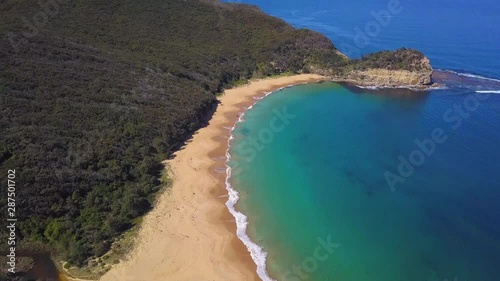 Waves crushing onto the beautiful Maitland Beach - Australia photo