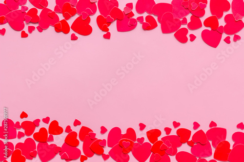 Heart frame for present carts on pink background top view mock up