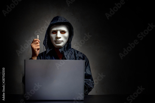 Vászonkép Male hacker hidden face with the mask and hoodie