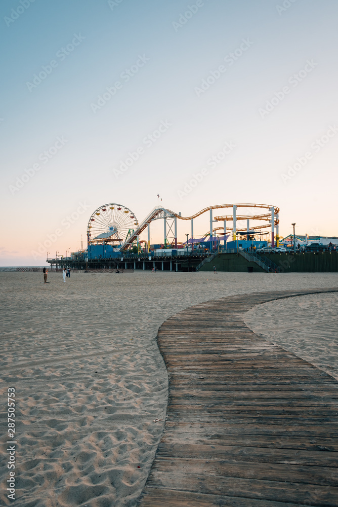 Path on the beach and the Santa Monica Pier in Los Angeles, California