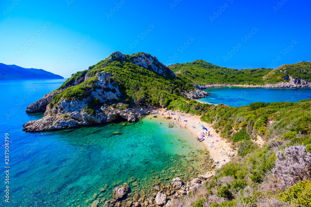 Naklejka premium Porto Timoni beach at Afionas is a paradise double beach with crystal clear azure water in Corfu, Ionian island, Greece, Europe