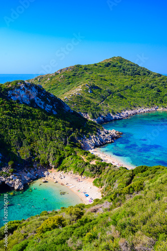 Porto Timoni beach at Afionas is a paradise double beach with crystal clear azure water in Corfu, Ionian island, Greece, Europe © Simon Dannhauer