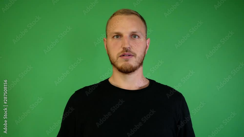 guy with a beard surprised on a chroma key guy with a beard surprised on a chroma key