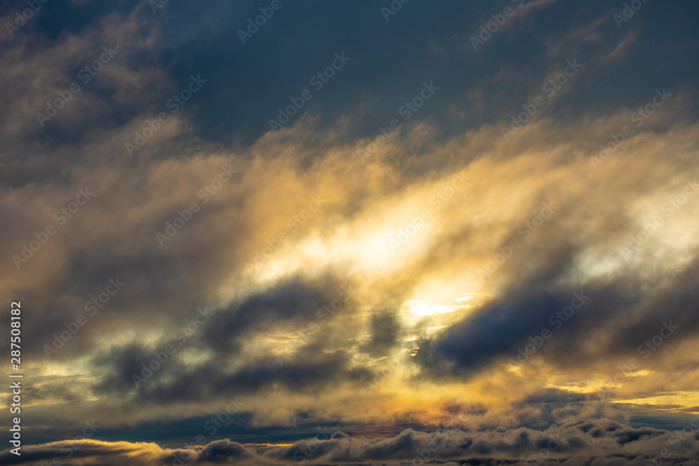 Obraz premium Landscape. Sunlit cloudy sky. Sunset