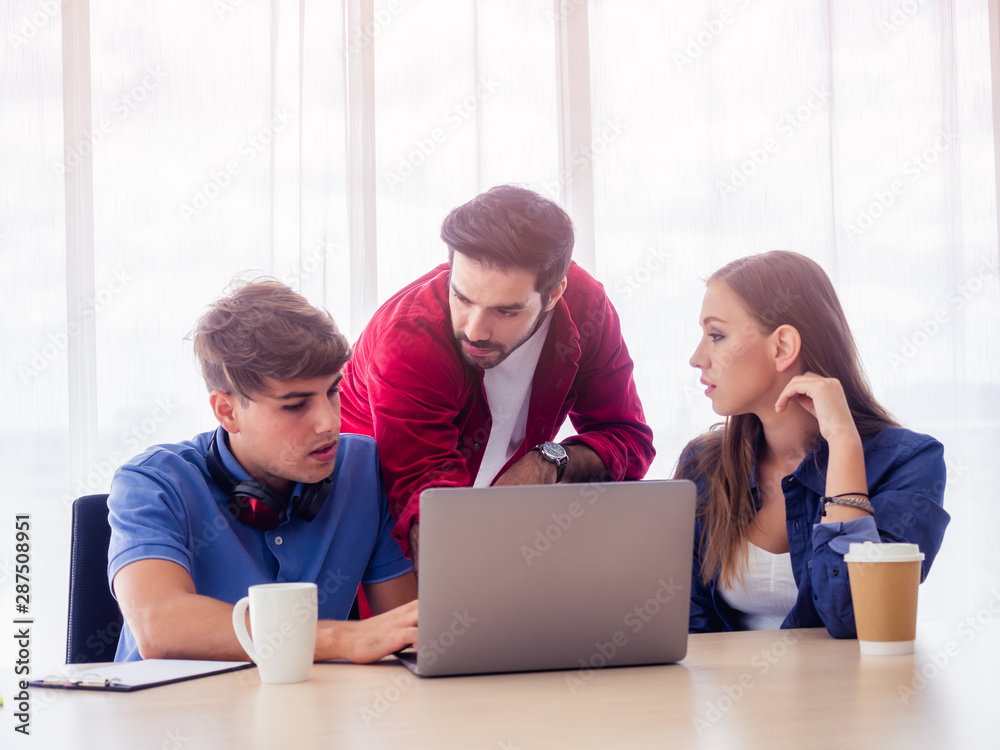 business people working and sitting at the office desk together,Employees are planning about work,business concept business people working and sitting at the office desk together,Employees are planning about work,business concept