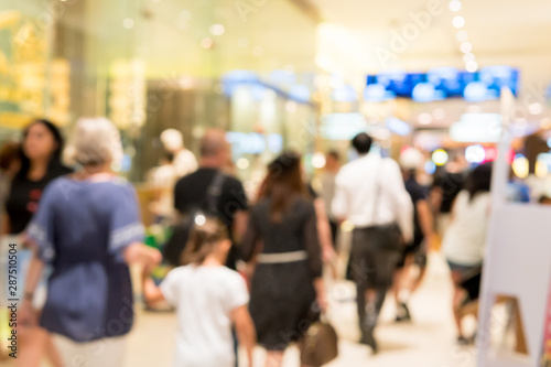Picture blurred for background abstract, People walking in shopping mall. © Siriwat